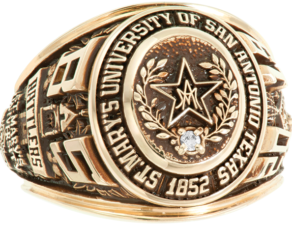 A golden Rattler Class Ring featuring a diamond in the center accented by an engraved laurel wreath with St. Mary's University of San Antonio Texas 1852 engraved around the face.